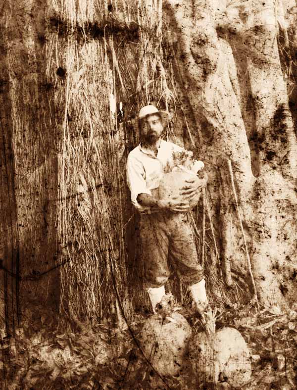 Edward Harvey con frutas de la isla en las manos